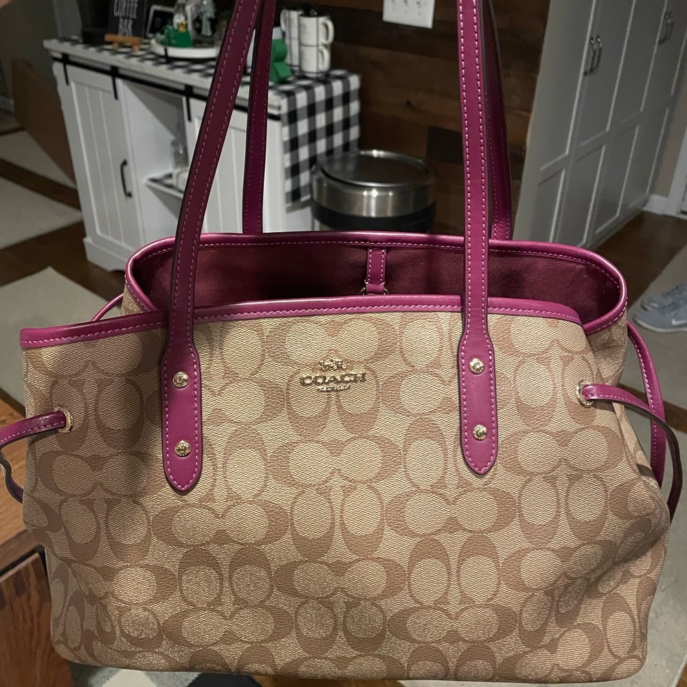 Leather Coach purse! Tan & magenta in color. Only used a few times! Like-new.
